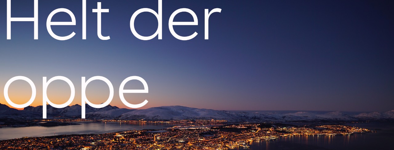 Kveldsbilde av Tromsø fra fjellheisen