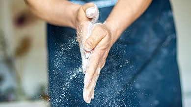 Hands full of flour