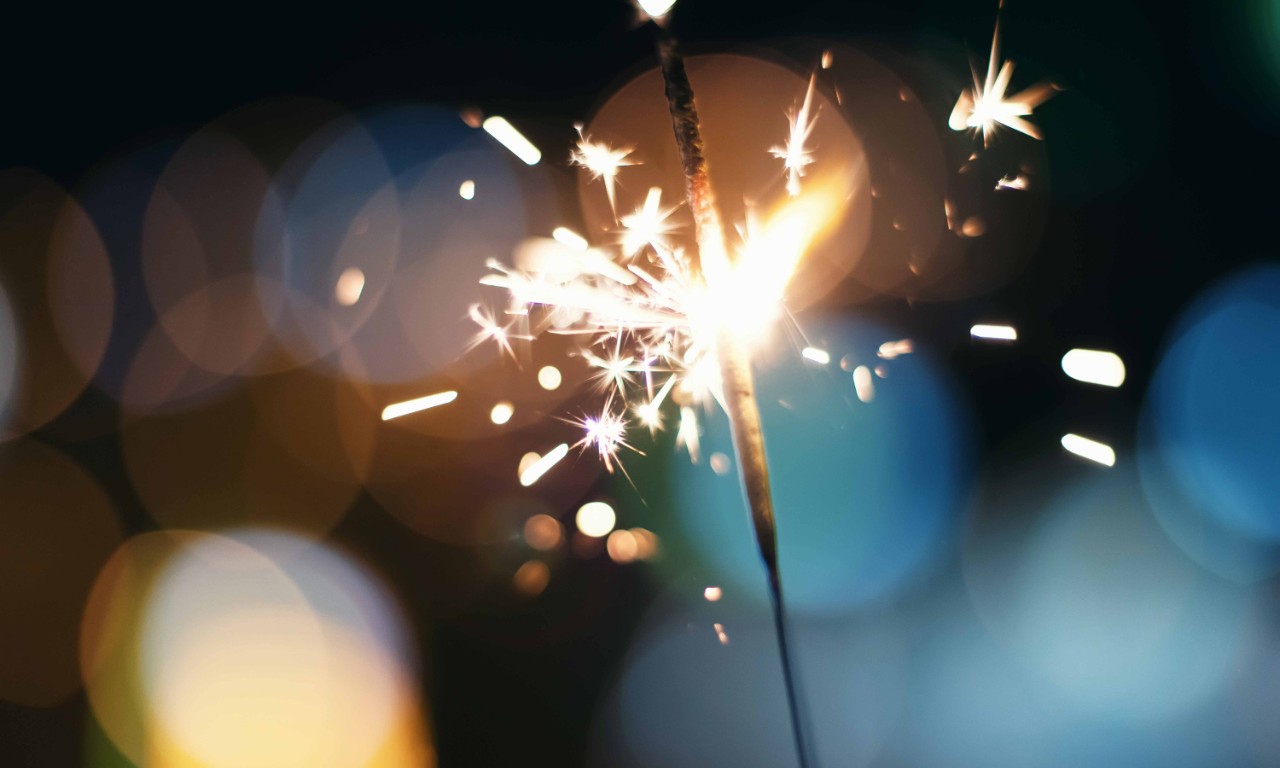 Sparkler  Bokeh  Colorful sparkler. Night background with a sparkler.