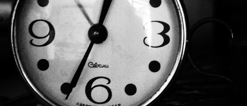 klokke illustrerer ventetid og avbruddsforsikring